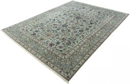 Corner detail of 1950s Kashan rug showing border pattern and Cork pile