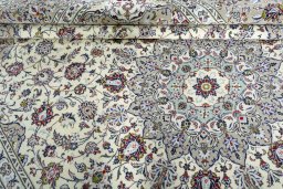 Close-up detail of New Kashan rug from Iran / Persia showing Wool weave