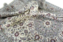 Surface texture of New Kashan rug with natural Wool and intricate pattern