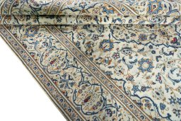 Close-up detail of 2000s Kashan rug from Iran / Persia showing Wool weave