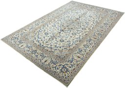 Corner detail of 2000s Kashan rug showing border pattern and Wool pile