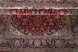 Close-up detail of 2000s Kashan rug from Iran / Persia showing Cork weave