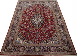 Surface texture of 2000s Kashan rug with natural Cork and intricate pattern