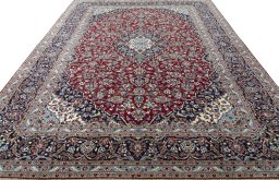 Surface texture of 2000s Kashan rug with natural Wool and intricate pattern