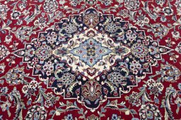 Central medallion detail of 2000s Kashan rug from Iran / Persia