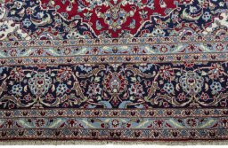 Full view of 2000s Kashan rug from Iran / Persia, 405 × 292 cm in Red tones