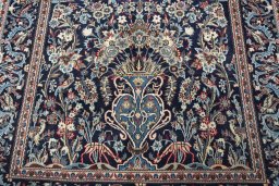 Central medallion detail of 2000s Kashan rug from Iran / Persia
