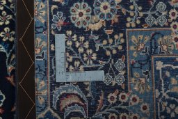 Surface texture of 2000s Kashan rug with natural Wool and intricate pattern