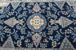 Central medallion detail of 2000s Kashan rug from Iran / Persia
