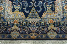 Close-up detail of 2000s Kashan rug from Iran / Persia showing Wool weave