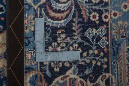 Surface texture of 2000s Kashan rug with natural Wool and intricate pattern