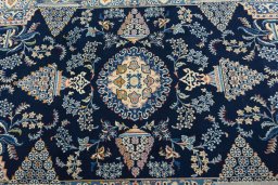 Central medallion detail of 2000s Kashan rug from Iran / Persia