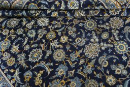 Close-up detail of 1970s Kashan rug from Iran / Persia showing Wool weave