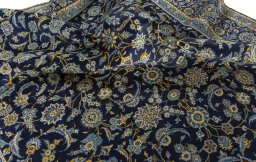 Surface texture of 1970s Kashan rug with natural Wool and intricate pattern