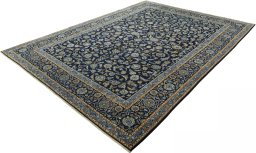 Corner detail of 1970s Kashan rug showing border pattern and Wool pile