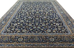 Surface texture of 1970s Kashan rug with natural Wool and intricate pattern