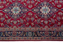 Full view of 2000s Kashan rug from Iran / Persia, 387 × 98 cm in Red tones
