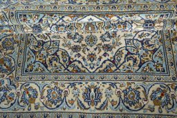 Close-up detail of 2000s Kashan rug from Iran / Persia showing Wool weave