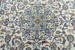 Central medallion detail of 2000s Kashan rug from Iran / Persia