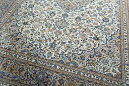 Close-up detail of 2000s Kashan rug from Iran / Persia showing Wool weave