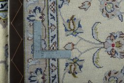 Close-up detail of 2000s Kashan rug from Iran / Persia showing Wool weave