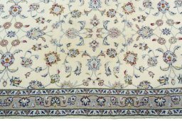 Close-up detail of 2000s Kashan rug from Iran / Persia showing Wool weave