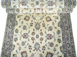 Full view of 2000s Kashan rug from Iran / Persia, 387 × 93 cm in Beige tones