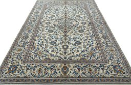 Surface texture of 2000s Kashan rug with natural Wool and intricate pattern