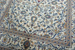 Close-up detail of 2000s Kashan rug from Iran / Persia showing Wool weave