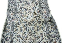 Close-up detail of New Kashan rug from Iran / Persia showing Wool weave