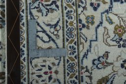 Surface texture of New Kashan rug with natural Wool and intricate pattern