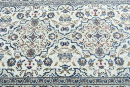 Central medallion detail of New Kashan rug from Iran / Persia