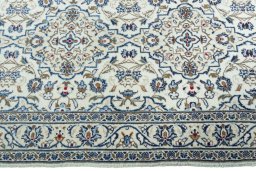 Full view of New Kashan rug from Iran / Persia, 300 × 97 cm in Beige tones
