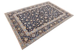 Corner detail of 1980s Kashan rug showing border pattern and Wool pile