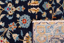 Full view of 1980s Kashan rug from Iran / Persia, 313 × 217 cm in Dark blue tones
