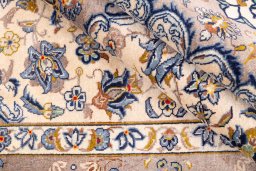 Close-up detail of 1980s Kashan rug from Iran / Persia showing Wool weave