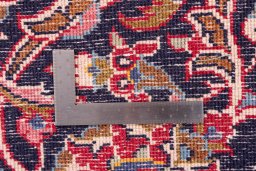 Surface texture of 1975s Kashan rug with natural Wool and intricate pattern
