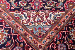 Full view of 1975s Kashan rug from Iran / Persia, 307 × 192 cm in Red tones