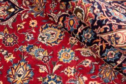 Surface texture of 1974s Kashan rug with natural Wool and intricate pattern
