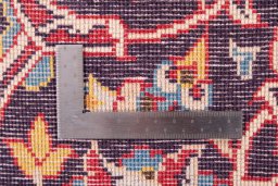 Backside of handmade 1974s Kashan rug showing knot structure and weave density