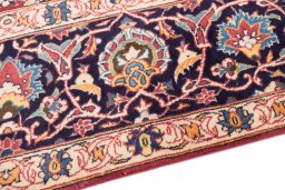 Backside of handmade 1974s Kashan rug showing knot structure and weave density