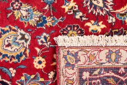Full view of 1974s Kashan rug from Iran / Persia, 326 × 195 cm in Red tones