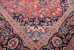 Close-up detail of 1980s Kashan rug from Iran / Persia showing Wool weave