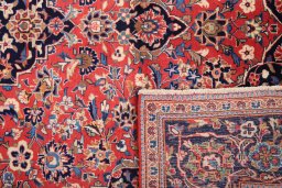 Full view of 1980s Kashan rug from Iran / Persia, 285 × 195 cm in Red tones