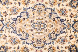 Corner detail of 1984s Kashan rug showing border pattern and Wool pile