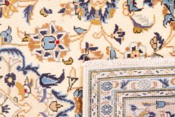 Full view of 1984s Kashan rug from Iran / Persia, 288 × 205 cm in Beige tones