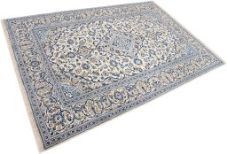Corner detail of 1990s Kashan rug showing border pattern and Wool pile