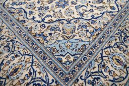 Close-up detail of 1990s Kashan rug from Iran / Persia showing Wool weave