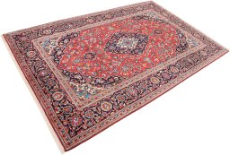 Corner detail of 1990s Kashan rug showing border pattern and Wool pile