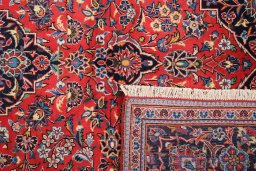 Full view of 1990s Kashan rug from Iran / Persia, 305 × 197 cm in Red tones